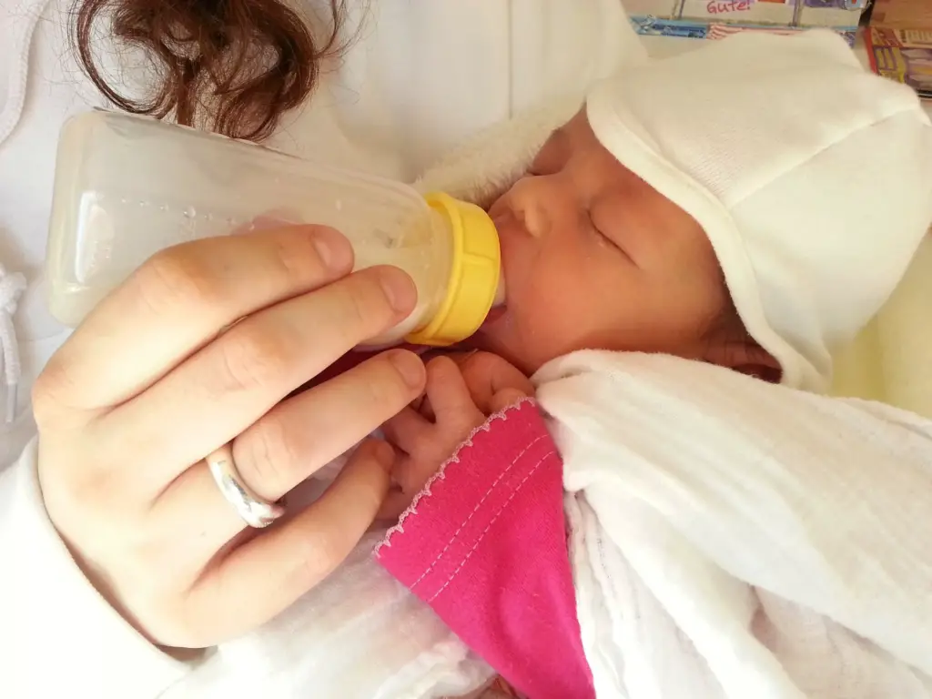 newborn baby eating